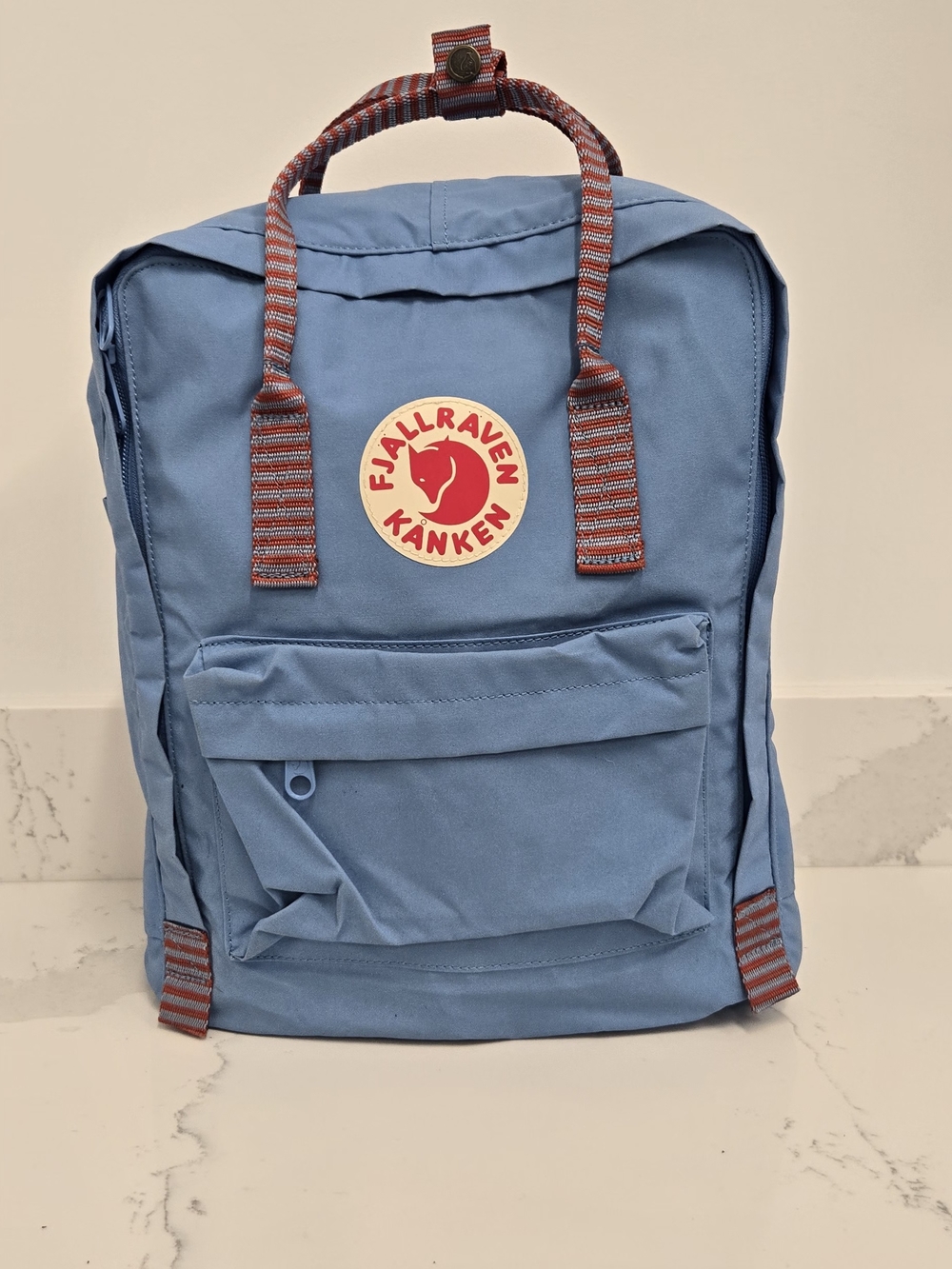 Fjallraven Kånken Backpack in Dusty Blue with Red Accent Straps